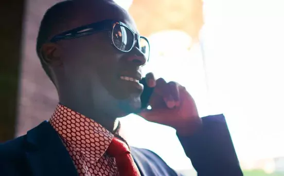 A man is talking on the phone